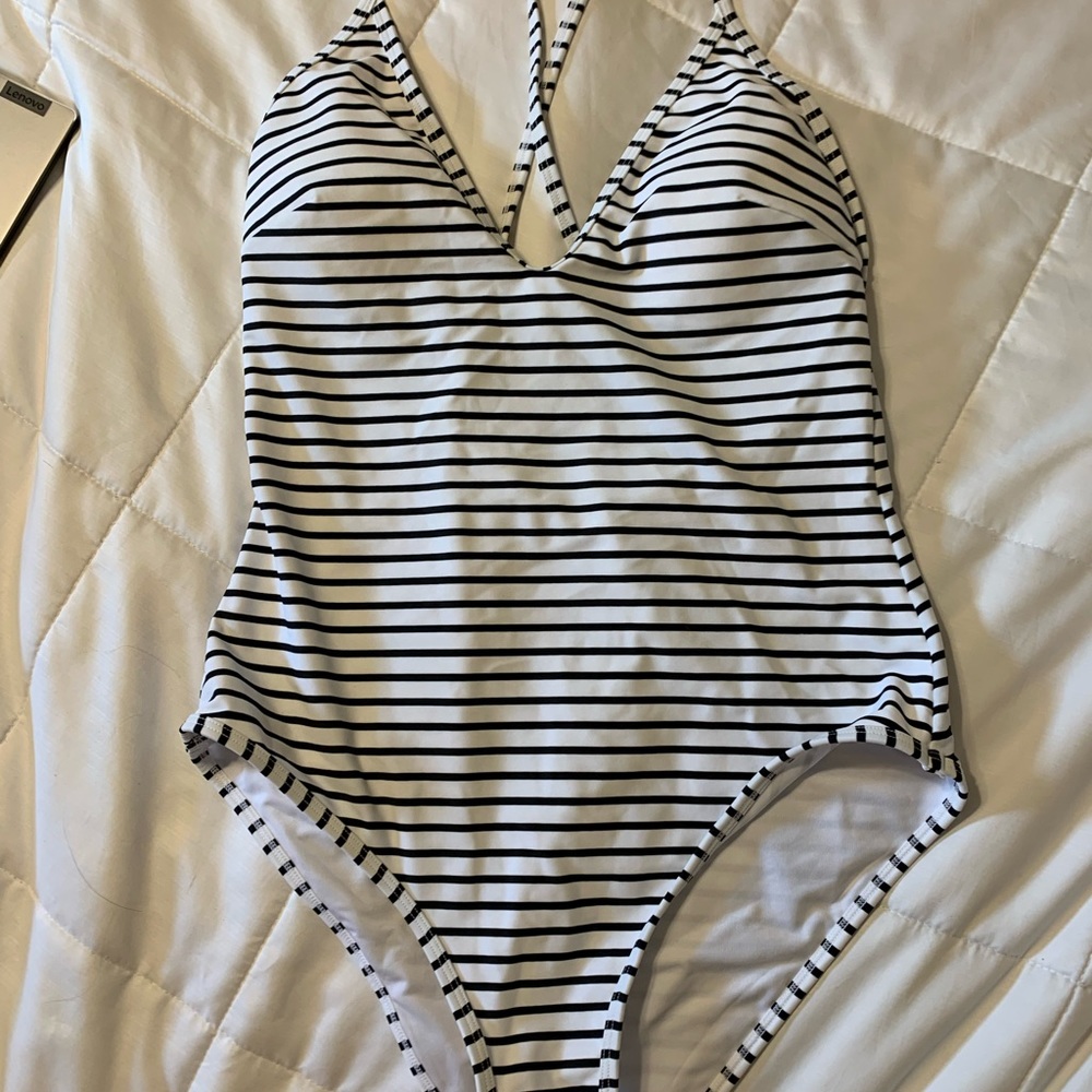 NWT Cupshe black and white striped v-neck one piece.